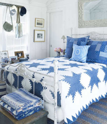 A blue and white country style guest bedroom